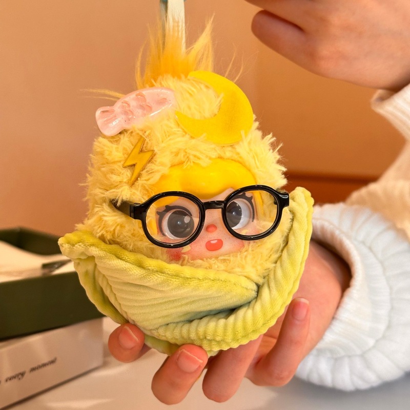 سلسلة مفاتيح على شكل دمية ذرة  - مراجعة Dolls وسعره